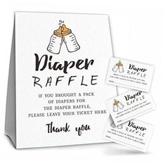 a baby bottle raffle is shown with two tags on it and the words,'diaper raffle if you brought a pack of diapers for the diaper raffle please leave your ticket here thank you