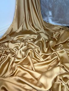 an image of a gold cloth that is very soft