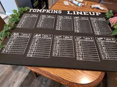 a table that has a menu on it with writing on the top and numbers on the bottom