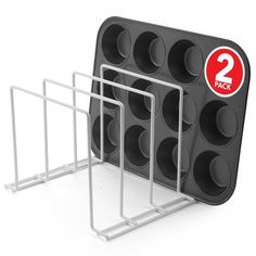 three cupcake pans are stacked on top of each other with the number 2 in them