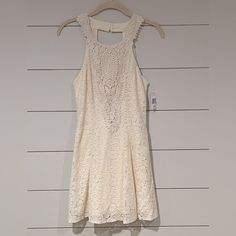 Jodi Kristopher Cream / Ivory Embroidered And Lace High Neck Dress Size 1 Nwt - Please View Pics For Measurements. Beautiful Cream Dress Which Is Great For Any Special Occasion. Back Is Stunning. Hits Above The Knee. Special Occasion / Formal / Embroidered / Lace / Homecoming / Wedding / Graduation Cream Lace Crochet Dress For Spring, Spring Cream Lace Crochet Dress, Sleeveless Beige Dress With Lace Work, Beige Sleeveless Dress With Lace Work, Spring Cream Crochet Dress With Lace Trim, Sleeveless Mini Dress With Lace Work, Cream Crochet Dress For Spring, Cream Sleeveless Lace Crochet Dress, Casual Cream Lace Mini Dress