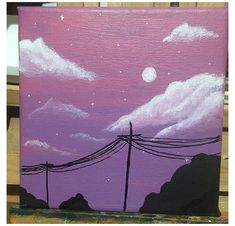 an acrylic painting of power lines and the moon