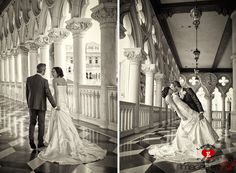 the bride and groom are standing in an ornate hall with chandeliers on either side