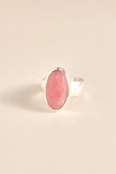 This gorgeous Rhodochrosite is enhanced by a nice dome bezel. The ring is made with 925 sterling silver. The ring is available in size 6,5. Dimensions: Total height: 19mm Total width: 12mm Stone height: 17mm Stone width: 9mm Stone + bezel thickness: 6mm Band width: 7mm to 5mm - Please note - * More photos or videos available on request * Go to 'About us' section for links to our socials and website * Only the ring is included in the price. * Gemstones are natural material, they can slightly differ in color, size, shape and may show some inclusions or cracks inside the stone itself. We do take great care in picking the best quality stones for best quality jewellery. Handmade Sterling Silver Pink Rings, Handmade Adjustable Pink Crystal Ring, Pink Sterling Silver Crystal Ring With Gem, Rhodochrosite Jewelry Rings, Rhodochrositee Earrings, Rhodochrosite Jewelry, Gemstone Jewellery, Natural Material, Ring Handmade