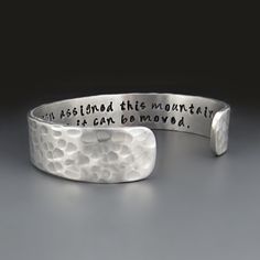 Men's Personalized Silver Cuff Bracelet, 1/2 inches wide This 1/2 inch wide cuff bracelet can be hand stamped with A MAXIMUM OF 80 LETTERS/NUMBERS/CHARACTERS  to create a truly one of a kind piece. Add special meaning to these cuffs by adding images to the outside edges of this cuff (MAXIMUM OF TWO) Click the link for more cuffs like this:  https://www.etsy.com/shop/SOJJewelry?ref=seller-platform-mcnav&section_id=23547294 CHECKOUT DIRECTIONS: ► IN THE PERSONALIZATION BOX add YOUR CUSTOM TEXT: Count the number of letters/numbers/punctuation/SPACES you have in your text. Choose that number range in the drop-down menu. TEXT CAN ONLY BE STAMPED ON ONE SIDE OF THE CUFF. ► AFTER YOU ADD THE CUFF TO YOUR CART, place your IMAGE CHOICES (MAX of 2), TEXT PLACEMENT (choose ONE, Either inside or outsi Personalized Silver Cuff Bracelet, Personalized Silver Bracelets, Jewelry For Him, Boyfriend Anniversary, Wide Cuff Bracelets, Stamping Tools, Boyfriend Anniversary Gifts, Cuff Detail, Wide Cuff