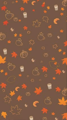 a brown background with autumn leaves and acorns on the bottom right corner is an orange cup