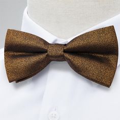 |​ FREE RETURNS | 30-DAY MONEY-BACK GUARANTEE | 100% SECURE CHECKOUT The design was created to impress with many suit colors! 100% Silk Handmade Includes: Bow Tie, Pocket Square and Cufflinks Self-Tie Warm iron if needed Classic Brown Bow Tie For Groom, Classic Brown Bow Tie For Wedding, Elegant Brown Bow Tie With Bow Tie Back, Elegant Brown Bow Tie With Satin Bow, Elegant Brown Adjustable Bow Tie, Suit Colors, Pocket Square, 30 Day, Bow Tie