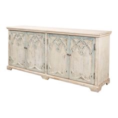 A Rustic French Gothic cabinet. This cabinet has four doors featuring a gothic arch design. A beautiful statement piece, perfect to use as a cabinet or sideboard.   This piece is crafted in pine and features an antique whitewashed blue finish.   Dimensions: 78" W x 20" D x 34" H Gothic Cabinet, Gothic Arch, French Gothic, Display Bookcase, Modern Gothic, Buffets And Sideboards, Kitchen Refresh, Antique Sideboard, White Sideboard