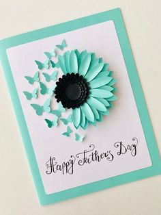 a greeting card with a flower and butterflies on the front that says, happy father's day