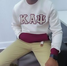 Show off your Kappa Alpha Psi pride with this stylish and comfortable sweatshirt. The design features the iconic Greek letters of the fraternity, making it the perfect addition to any Greek collection. Whether you're out on campus or hanging out with your brothers, this sweatshirt is sure to turn heads and start conversations. Made from high-quality materials, this sweatshirt is both durable and comfortable. It's perfect for wearing to class, to events, or just lounging around. The Fraternity organization aspect of this item makes it a must-have for any Nupe or Kappa Alpha Psi member. Add this unique piece to your collection today and show your support for this historic and respected organization. Fast Shipping & Processing: 1-2 days to process US Domestic Shipping: 3-5 business days Inter Varsity French Terry Sweats For College, Varsity Style French Terry Sweats For College, White Crew Neck Sweatshirt With Letter Patch, French Terry Varsity Sweats For College, Hexagon Embroidery, College Wardrobe, Cream Embroidery, Kappa Alpha Psi, Embroidery Sweater