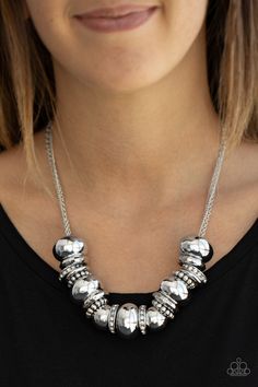 An edgy collision of oversized silver beads, white rhinestone encrusted rings, and studded and hammered hoops slides along dainty silver chains, creating metallic mayhem below the collar. Features an adjustable clasp closure. Paparazzi Jewelry Images, Only The Brave, Hammered Necklace, Silver Chains, Ball Necklace, Paparazzi Accessories, White Necklace, Rhinestone Studs, White Rhinestone