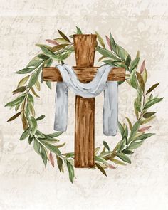 a cross with leaves around it and a white scarf hanging from the cross in front of it