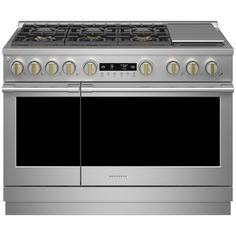 a stainless steel oven with four burners and two doors on the front, side by side