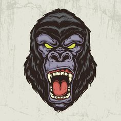 an angry gorilla head with yellow eyes and fangs on it's face is shown