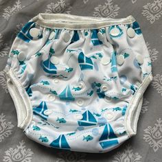 Blue And White Swim Diaper One Size - Multiple Snap Buttons For Size Adjustment Sailboat And Blue Fish Print - Perfect For Summer Beach / Lake Weather Nwot / Never Used Blue Bottoms For Playtime, Machine Washable, Playful White Machine Washable Bottoms, Blue Bottoms For Playwear, Machine Washable, Blue Playwear Bottoms Machine Washable, White Swim, Blue Fish, Fish Print, Kids Swimming, Summer Beach