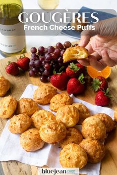 the cover of gougeries french cheese puffs, with strawberries and grapes