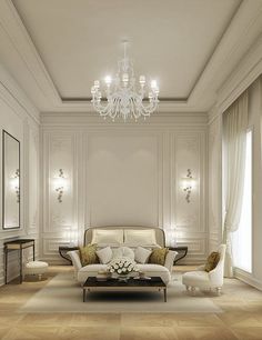 a living room filled with furniture and a chandelier