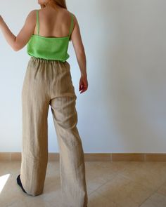 Beginner-friendly Digital Sewing Pattern for women's trousers. Easy to sew and suitable for every season and occasion. They're designed in a wide-leg silhouette with an elasticated high-rise waist, floor-skimming hems, and no pockets. This pattern is versatile, so you can sew yours using woven fabrics, such as linen or satin, or knit/jersey fabrics to make track pants for a more casual outfit. Green Wide-leg Pull-on Pants, Wide Leg Pants Sewing Pattern, Pants Sewing, Pants Sewing Pattern, Womens Wide Leg Pants, Woven Fabrics, Fabric Width, Pdf Sewing Patterns, Women's Trousers