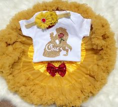 This listing is for Baby girl's Belle theme First Birthday outfit . Includes 1.Bodysuit 2.Premium fluffy Pettiskirt 3. Headband Shoes sold separately https://www.etsy.com/listing/840596116/baby-girl-shoes-golden-baby-shoes-belle?ga_search_query=Shoes&ref=shop_items_search_1&crt=1 Name can be added on the bodysuit. Please leave a note in the note to seller box upon checkout for personalization. Bodysuit used is carter's brand . Carter's Bodysuit is Crafted in babysoft cotton, Easy to change with Second Birthday Outfit, Belle Outfit, Snow White Birthday Party, Outfit Yellow, 2nd Birthday Outfit, Baby Nursery Themes, July Baby, First Birthday Outfit, Gold Outfit