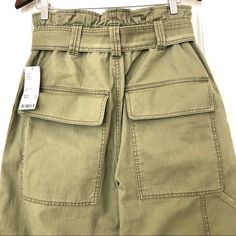 Nwt Olive Color Wide Leg Carpenter Pants With Belt Size M Waist To Bottom 39” Inseam 27” Bottom Width 8.5” Waist Stretches From 32” To 35” Spring Cargo Pants With Paperbag Waist And Pockets, Spring Cargo Pants With Paperbag Waist, Cotton Cargo Pants With Paperbag Waist, Khaki Paperbag Waist Pants With Pockets, Utility Paperbag Waist Bottoms With Pockets, Utility Cotton Bottoms With Paperbag Waist, Paperbag Waist Cargo Pants With Pockets For Workwear, Khaki Pants With Patch Pockets, Paperbag Waist Cargo Pants For Work