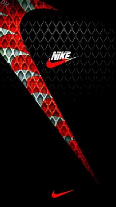 the nike logo is on top of a chain link fence with red and white circles