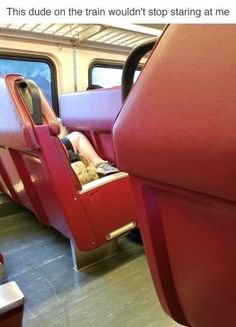 a person sleeping on a train seat with the door open