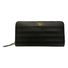 A Beautiful Addition To Your Handbag This Valentino Garavani Diary Lines Wallet Is Perfection. This Stylish Valentino Leather Wallet Has Subtle Lines Similar To Diary Paper With Subtle Black Stitching Pulling This Look Together. This Zip Around Wallet Features A Spacious Interior With 12 Credit Card Slots, Zipper Coin Compartment And 2 Bill Compartments. A Gold-Tone V Logo Completes The Look Of This Simple And Elegant Wallet. Model: Sw2pp0645xwq Black Leather Zip Closure Gold-Tone Hardware V Log Diary Paper, Valentino Wallet, Elegant Wallet, Valentino Garavani Bag, V Logo, Card Purse, Leather Card Case, Leather Bifold Wallet, Wallet Organization