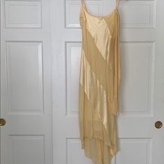 Never Worn. Adjustable Straps. 100% Rayon With Silk Details On The Front. Falls Below The Knee In The Front And To The Ankle In The Back. Smoke Free Home. Yellow Bias Cut Summer Dress, Yellow Bias Cut Dress For Summer, Yellow Bias Cut Dress For Spring, Summer Gold Silk Maxi Dress, Gold Silk Maxi Dress For Summer, Yellow Silk Slip Dress For Summer, Fitted Bias Cut Beach Dress, Long Gold Maxi Dress For Summer, Gold Bias Cut Summer Dress