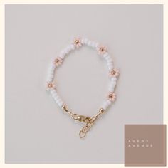 Exquisite! Captivating! Elevate your style with Flower Beaded bracelet- durable gold filled bracelet, available for a limited time at the incredible price of $23.00 #bracelet #BabyShowerGift #MommyAndMe #jewelry #GoldFilled #anklet #BabyBracelet #ToddlerBracelet #FlowerBracelet #BeadedBracelet Adjustable Rose Gold Beaded Bracelets With 8mm Beads, Adjustable White Pearl Bracelet In 14k Gold Filled, Adjustable Hand-strung 14k Gold Filled Stretch Bracelet, Adjustable White Gold Hypoallergenic Bracelet, Everyday Adjustable Hand-strung Gold Bracelet, Adjustable 14k Gold Filled Beaded Bracelets With Spacer Beads, Handmade 14k Gold-filled Round Bead Bracelets, Adjustable Hand-strung 14k Gold Filled Bracelet, Handmade Adjustable Pearl Bracelet With 14k Gold Filling