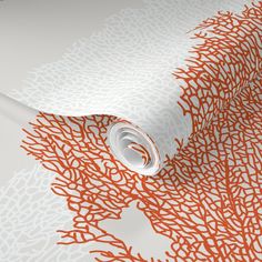 an orange and white wallpaper with red corals on the bottom half of it