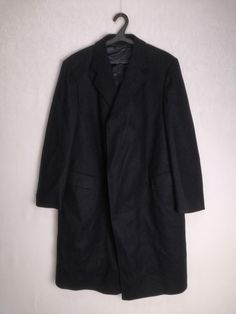 TOP AACHEN vintage men's Austrian navy blue loden wool coat Very good condition Size tagged 51, fits like XL (please check measurements) Composition: 100% wool (outer shell), 100% viscose (lining) Measurements: Shoulder to shoulder - 18.9" / 48 cm Pit to pit - 23.6" / 60 cm Back length from collar - 41.3" / 105 cm Sleeve length from shoulder - 25.2" / 64 cm * All measurements are taken with the garment laying flat #5327 Vintage Long Winter Sport Coat, Single Breasted Uniform Style Winter Outerwear, Winter Uniform Style Single Breasted Outerwear, Winter Uniform Style Single-breasted Outerwear, Vintage Wool Peacoat For Winter, Vintage Winter Sport Coat For Formal Occasions, Vintage Winter Outerwear For Formal Occasions, Vintage Formal Winter Outerwear, Vintage Outerwear For Formal Winter Occasions