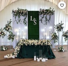 the table is set up with candles and flowers