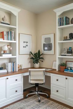 a home office with white cabinets and wooden desk top, bookshelves on the wall