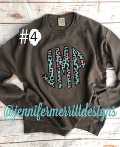 Comfort Color monogram sweatshirt comes with a large chest leopard fabric appliqué that is perfect to wear on cool fall days or brighten up your winter wardrobe! Comfort Colors sweatshirts are out of stock. Comfort Wash brand is a great alternative. Light weight and oversized. Choose CW Railroad Gray or Comfort Wash Gray. 🐆 Leopard fabric shown is out of stock. You will get option #2 #3, #4, #5 or #6. If you don't specify in the notes at checkout then I will pick. Sweatshirt show is pepper with Casual Long Sleeve Monogram Sweatshirt, Casual Long Sleeve Sweatshirt With Monogram Print, Casual Monogram Print Sweatshirt For Winter, Fall Cotton Tops With Monogram, Casual Monogram Print Sweater For Fall, Black Monogram Print Tops For Fall, Monogram Cotton Tops For Fall, Fall Crew Neck Sweatshirt With Monogram Print, Cotton Monogram Print Top For Fall