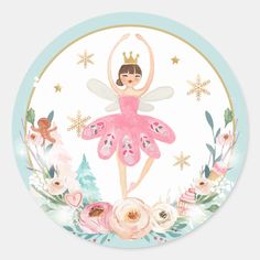 a plate with a girl in a pink dress and flowers on the side, surrounded by snowflakes