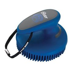 a blue hair brush sitting on top of a white surface