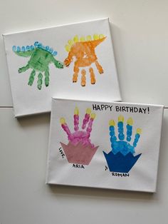 two handprints with different colored hands on them