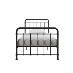 an iron bed frame with four pillows on top and bottom, against a white background