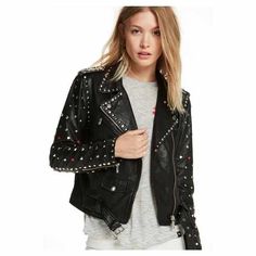 Expertly crafted for the bold and stylish woman, our Black Studded Leather Motorcycle Jacket adds an edgy touch to any outfit. Made from high-quality leather and adorned with intricate studded details, this jacket provides both durability and fashion-forward appeal. Perfect for riding or adding a touch of attitude to your everyday look. Punk Women Fashion, Jaket Motor, Punk Leather Jacket, Fashion Leather Jacket, Fitted Biker Jacket, Stylish Leather Jacket, Punk Women, Studded Leather Jacket, Black Punks