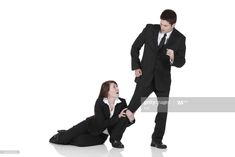 two business people in suits on the floor