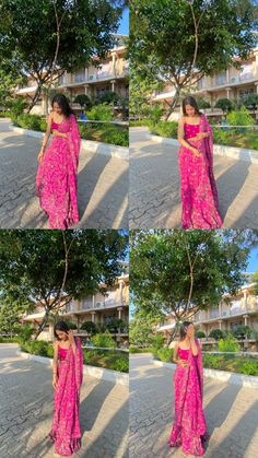 a woman in a pink sari is posing for the camera