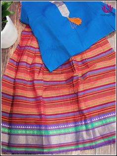 Mangalagiri cotton lehenga for kids in Blue top and Multicolored striped petticoat type skirt bottom with zari border. Size - 2/3 yr old Please note: Color may vary slightly from the picture. Handwash/dry clean only Lehenga For Kids, Cotton Lehenga, Blue Top, Petticoat, Lehenga, Size 2, For Kids, Dry Clean, Textiles