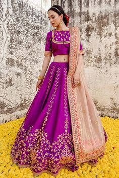 Magenta can can attached lehenga with all over marori paisley embroidery and gota embellishments. Comes with matching padded blouse and dupatta.
Components: 3
Pattern: Embroidered
Type Of Work: Thread, Gota, Marori
Neckline: Round
Sleeve Type: Half
Fabric: Lehenga and Blouse: Pure Spun Silk, Dupatta: Pure Organza
Color: Magenta
Other Details: 
Attached lining
Approx. Product Weight: 2.50kg
Closure:
Lehenga: Side drawstring
Blouse: Front hook
Model Height: 5 ft 7 inches, wearing size S
Note: Only Anarkali Purple Choli For Traditional Ceremonies, Navratri Lehenga With Tilla For Traditional Ceremonies, Purple Lehenga For Navratri Ceremonies, Purple Lehenga For Navratri Traditional Ceremonies, Lehenga With Tilla For Traditional Ceremonies During Navratri, Semi-stitched Purple Lehenga For Traditional Ceremonies, Semi-stitched Tilla Set For Traditional Ceremonies, Purple Lehenga With Dupatta For Traditional Ceremonies, Purple Lehenga For Traditional Ceremonies