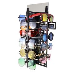 a rack that has many pairs of sunglasses on it