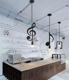 a coffee shop with musical notes hanging from the ceiling