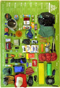 an assortment of items laid out on a green mat