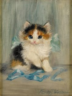 a painting of a kitten sitting on top of a blue cloth covered floor next to a wall