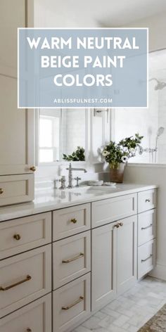 a bathroom with white cabinets and gold hardware on the counter top, is featured in this article