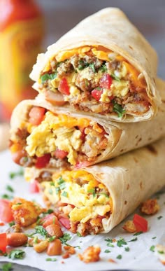 two burritos stacked on top of each other