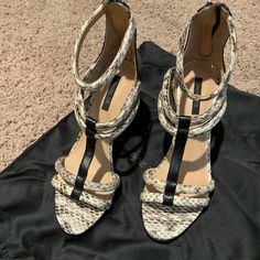 Size 8 Black/Off White/Beige Snake Print. Never Worn. Comes With Shoe Bag Shown. I Can’t Wear Heels Anymore Gotta Stick With Flats So Trying To Find These Lovely Shoes A Good Home. Chic Cream Wedge Sandals For Day Out, Chic High Heel Wedge Sandals For Day Out, Chic Cream Wedge Sandals With Ankle Strap, Chic Cream Ankle Strap Wedge Sandals, Chic Cream Wedge Sandals With Open Heel, Chic Cream Wedge Sandals For Party, Chic Cream Wedge Sandals With Heel Strap, Chic Cream High Heel Wedge Sandals, Nude Wedges